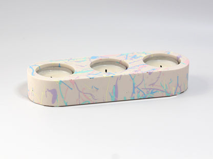 Tealight candle holder with pastel splashes