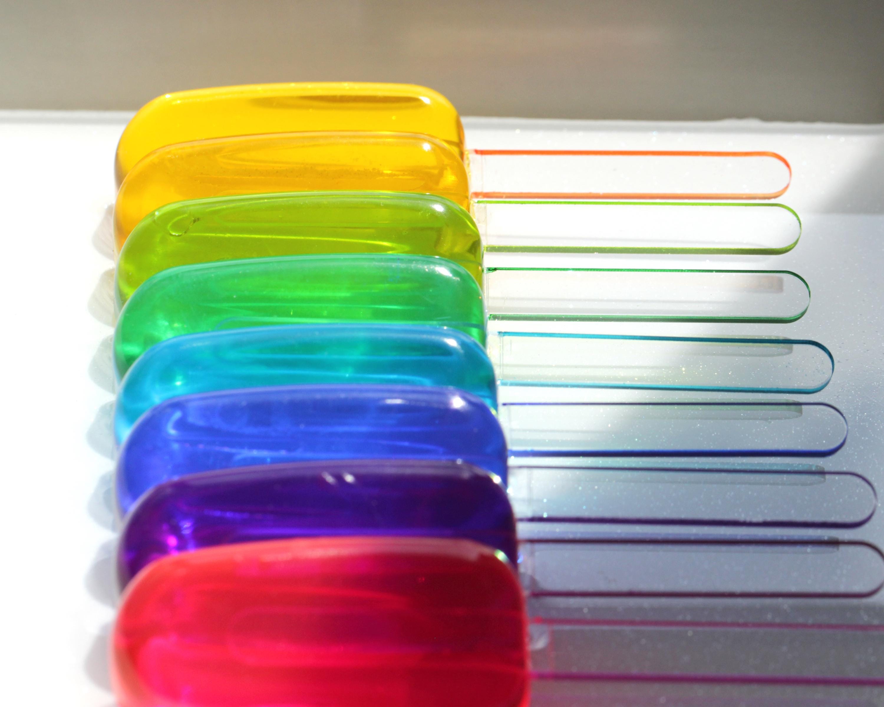 Kids room decor of a rainbow popsicles wall art | colorful modern home decor
