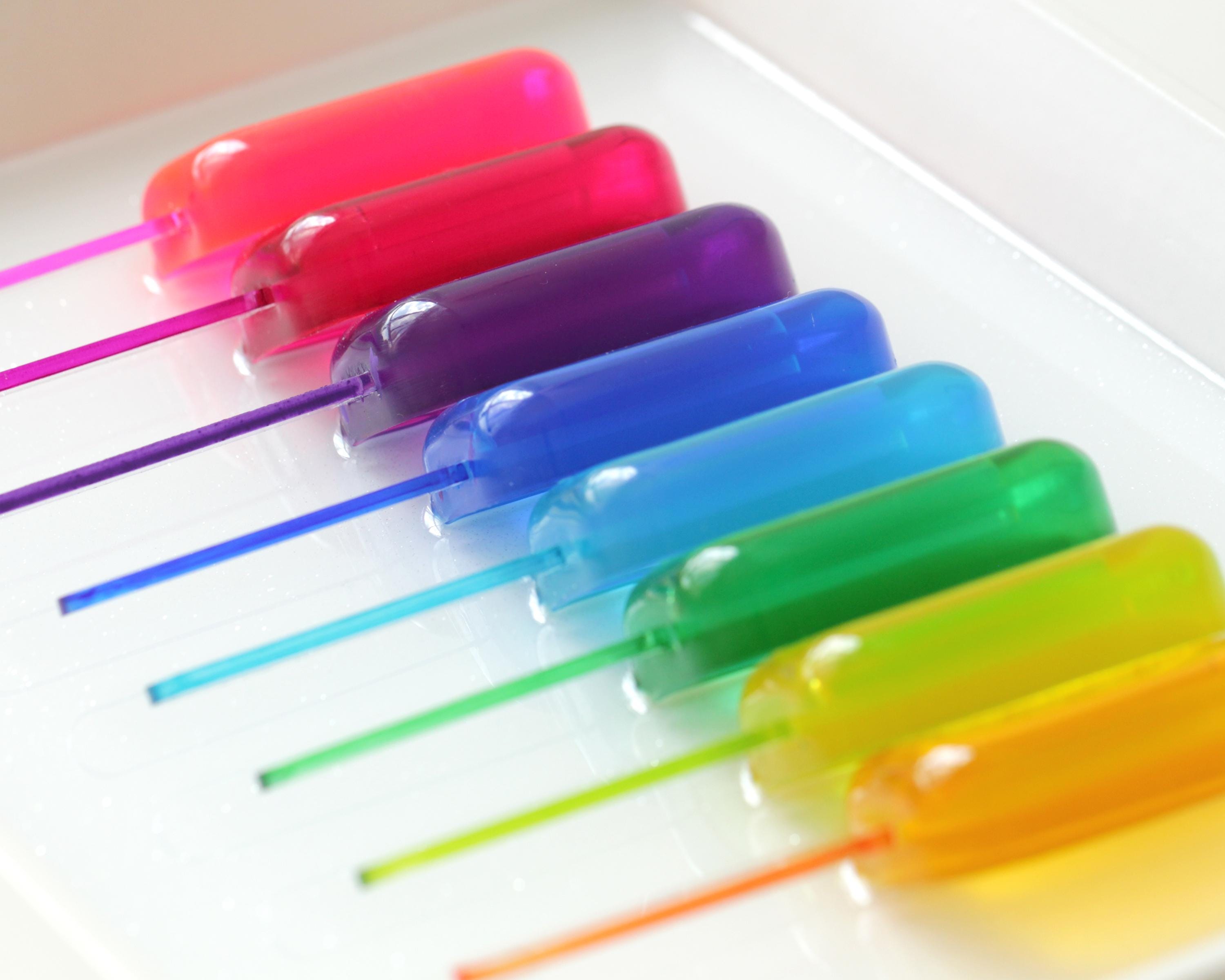 Kids room decor of a rainbow popsicles wall art | colorful modern home decor