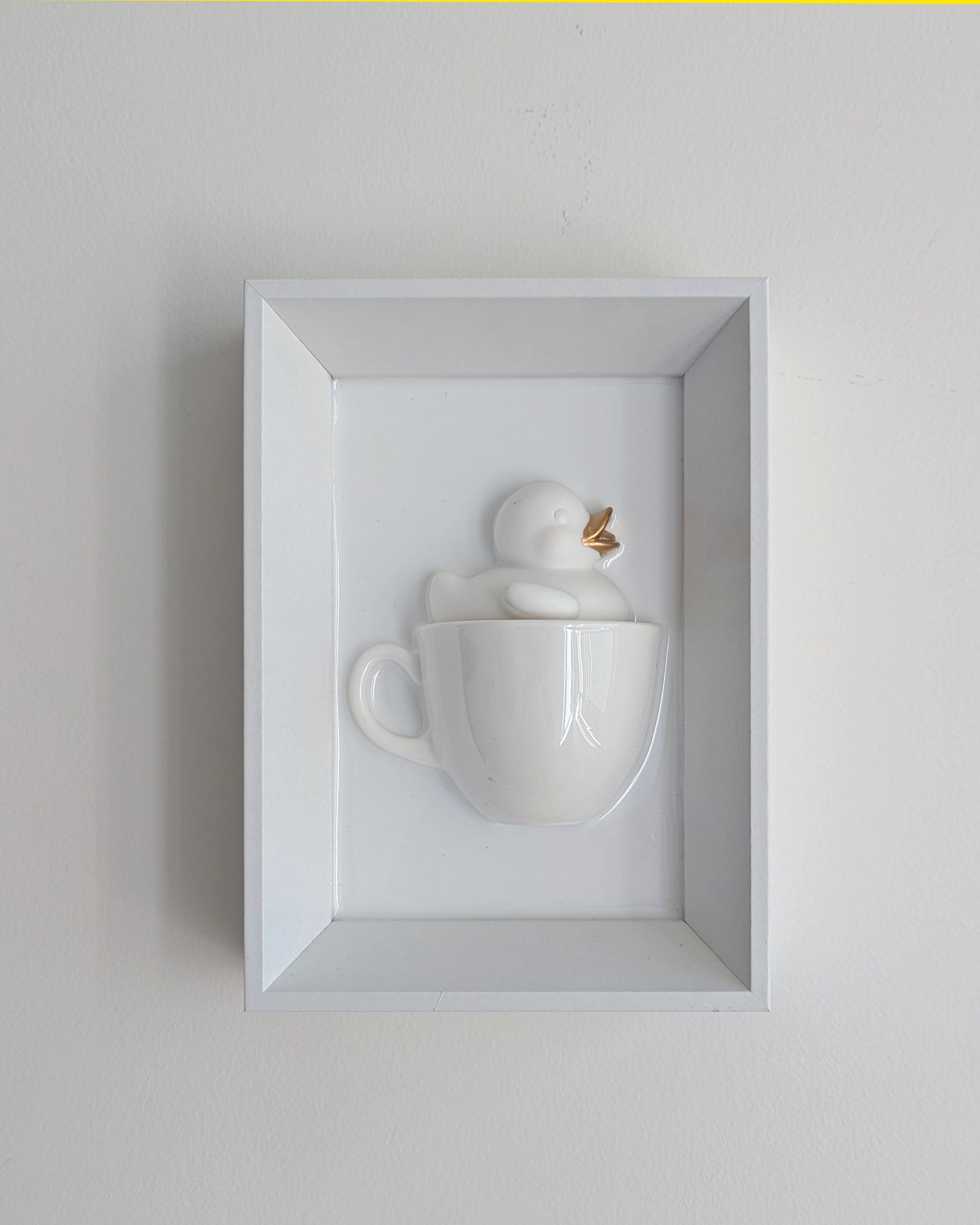 Duck in a coffee cup - white